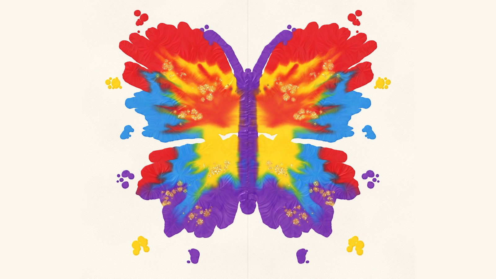 A symmetrical butterfly print in red, yellow, blue and purple paint, made in Fold & Squish